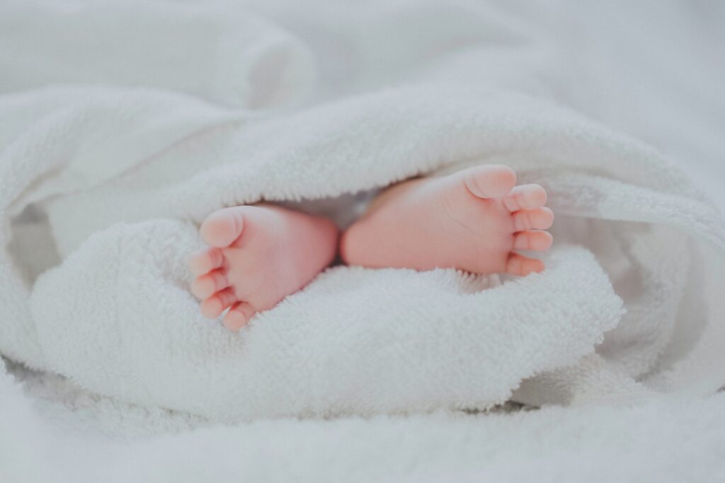 baby feet in towel