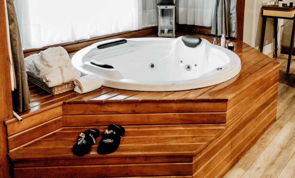 Bathroom with Wooden Floors and Jacuzzi Tub