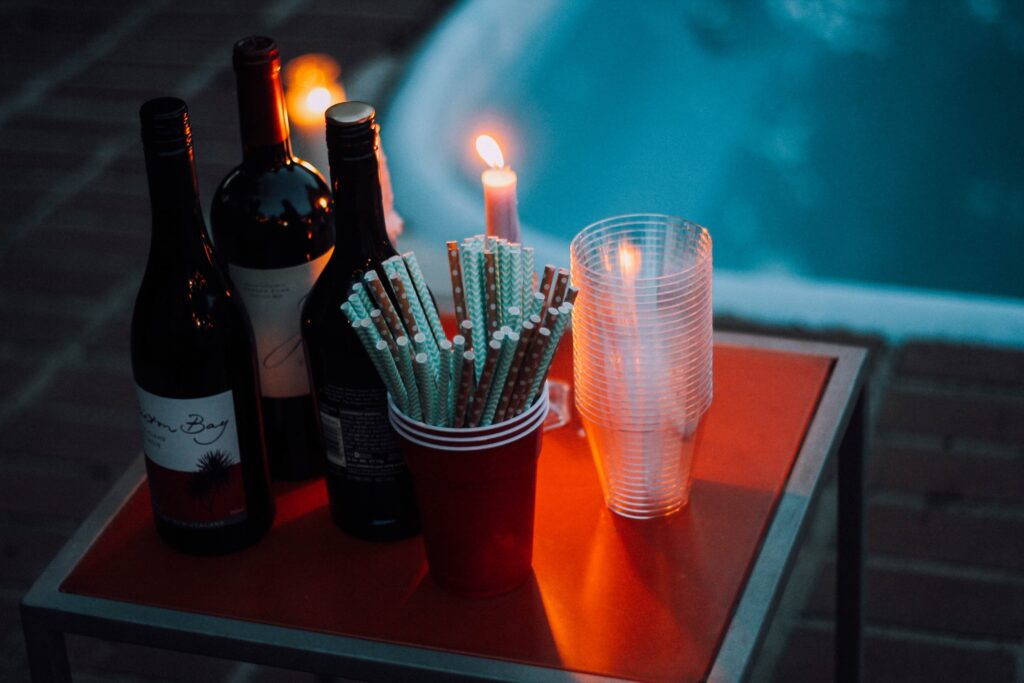 Bottles and candles near a hot tub