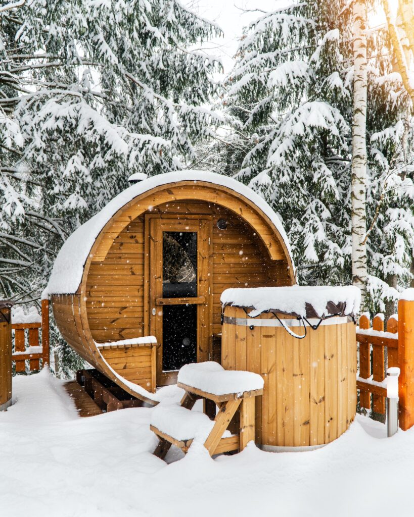 a brown wooden barrel sauna